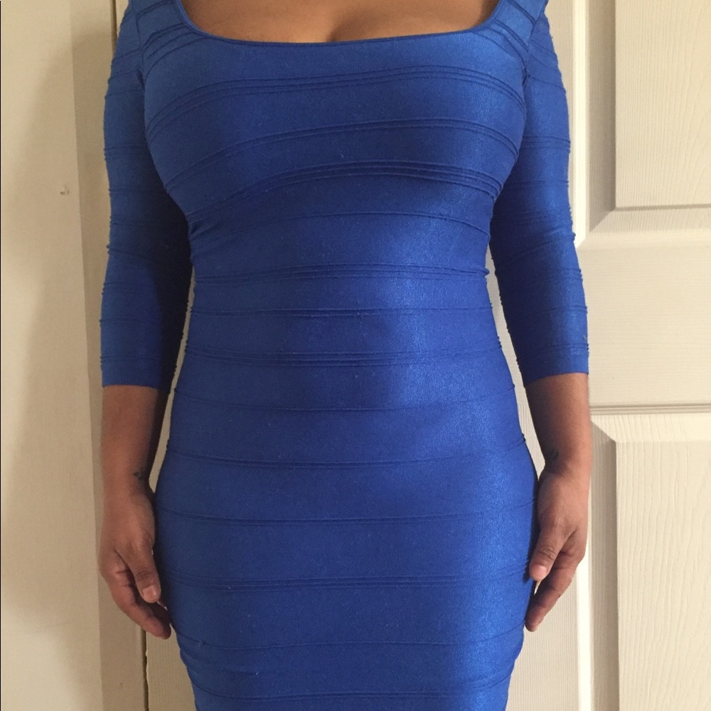 Tight fitted blue Bebe midi dress.